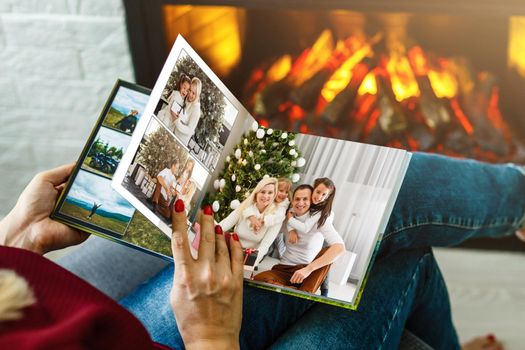 photobook with christmas photos. Winter cozy.