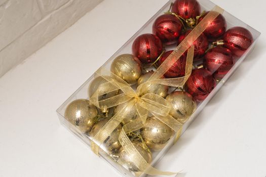 beautiful red gold and silver Christmas balls isolated on white.