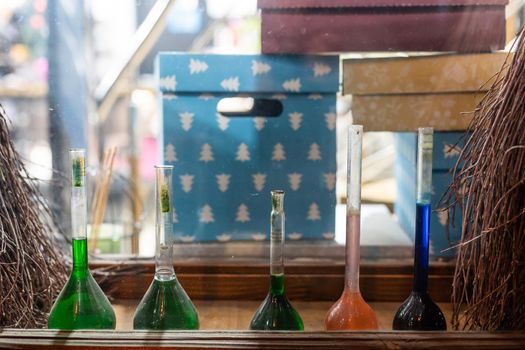 Chemistry laboratory. Conducting a chemical experiment. Experiments in the laboratory. Flasks and test tubes with colored liquid. The child conducts an experiment in a chemical laboratory. The science.