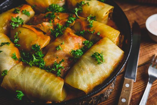 Stuffed Cabbage Rolls in Frying Pan Served with Fresh Parsley