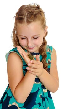 Attentive little girl looking at in the palms of a small turtle. Closeup.Isolated on white background.