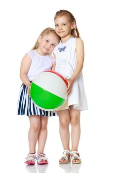 Two little girls are playing with a ball. Game concept, rest on the sea.Isolated on white background.