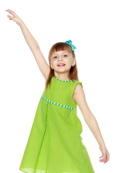 A little girl with long blond hair and a short bangs, in a short summer dress.The girl raised her hand up.