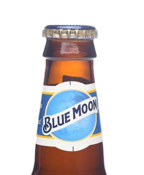 IRVINE, CALIFORNIA - 2 JUNE 2020: Blue Moon Belgian White Ale bottle neck label closeup. 