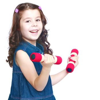 Cheerful sporty girl holding dumbbell. Isolated on white background .