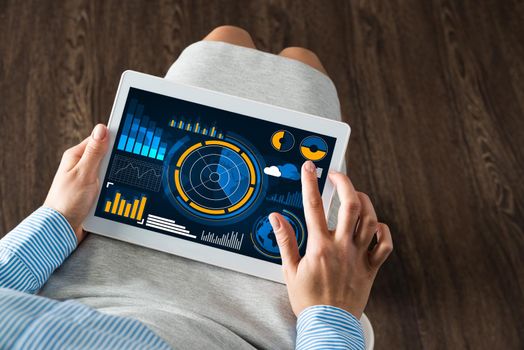 close-up business woman with computer tablet on lap