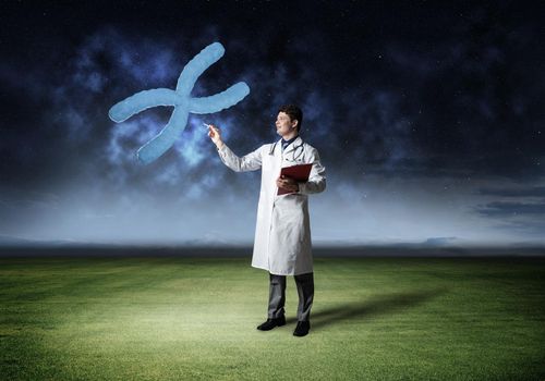 Doctor touches chromosome symbol, virtual technology in medicine