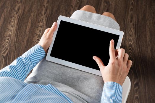 close-up of female hands with a computer tablet