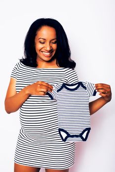 young pretty african american woman pregnant happy smiling, posing on white background isolated , lifestyle people concept copyspace close up