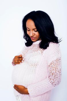 young pretty african american woman pregnant happy smiling, posing on white background isolated , lifestyle people concept copyspace