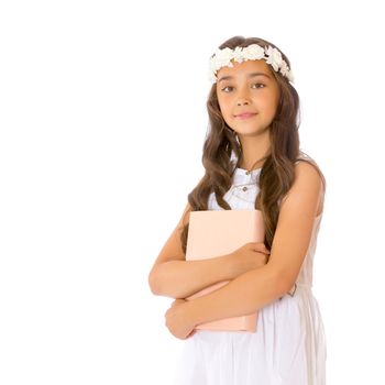 Little girl with book. The concept of education in school or kindergarten. Isolated over white background