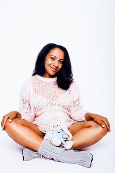 young pretty african american woman pregnant happy smiling, posing on white background isolated , lifestyle people concept copyspace close up