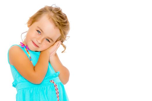 Beautiful little girl close-up. The concept of beauty and fashion, happy childhood. Isolated on white background.