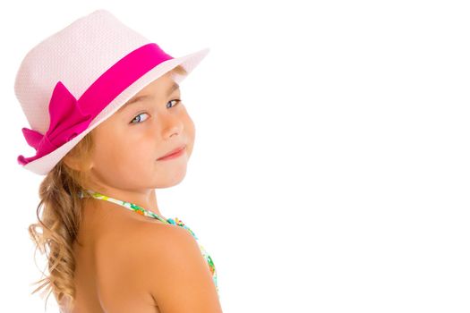 Beautiful little girl close-up. The concept of beauty and fashion, happy childhood. Isolated on white background.