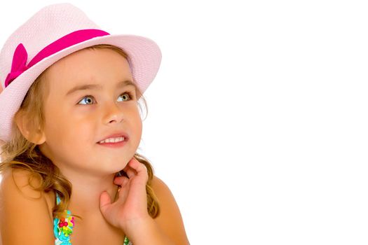 Little girl in a hat. The concept of fashion, children's recreation at sea. Isolated on white background.
