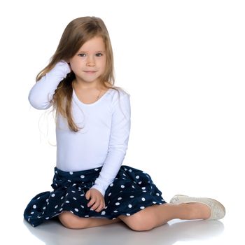 A sweet girl straightens her hair. The concept of fashion and style. Isolated over white background