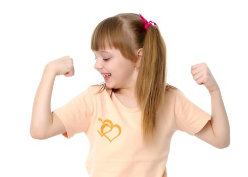 Beautiful little girl shows her muscles. The concept of strength, health and sport. Isolated on white background.