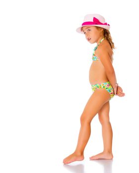 Beautiful little tanned girl in a swimsuit and a hat. The concept of summer family vacations, rest on the sea, beautiful tan. Isolated on white background.