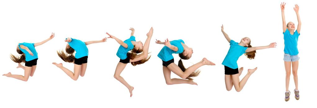 Girl gymnast performs a jump. The concept of fitness, gymnastics, sports. Isolated on white background.