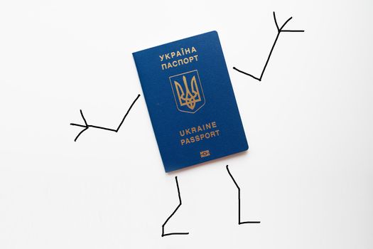 Ukraine passport with painted hands and feet shows gesture ok