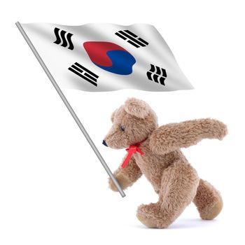 A South Korea flag being carried by a cute teddy bear