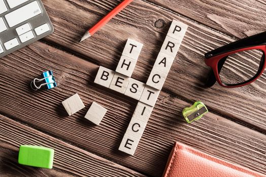 Words of business marketing collected in crossword with wooden cubes