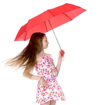 Beautiful teenage girl, in a summer dress under an umbrella. The concept of a happy childhood, summer outdoor recreation. Isolated on white background.