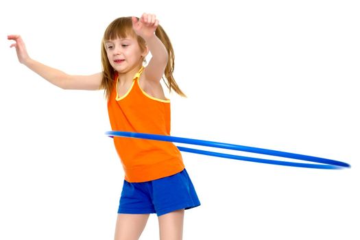 A girl gymnast performs an exercise with a hoop. The concept of gymnastics and fitness. Isolated on white background.