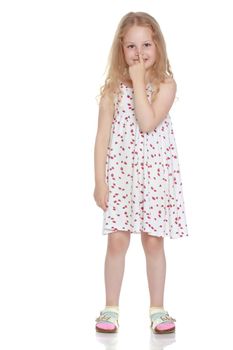 Little girl, the gesture is quiet. The concept of secrecy, games, observance of silence. Isolated over white background