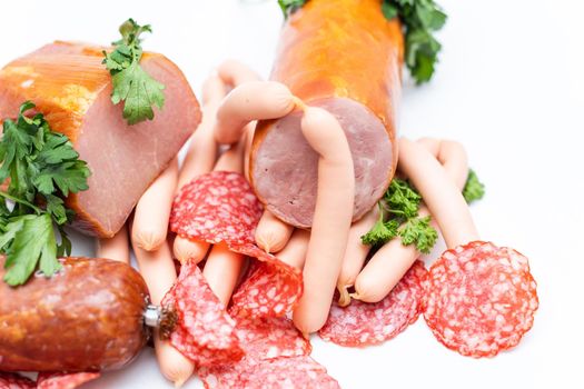 Meat and sausages. Isolated on white.