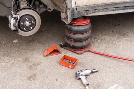 car brake part at garage,car brake disc without wheels closeup