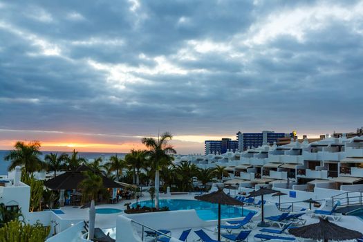 The view from the terraces of the beautiful sunset on the beach.