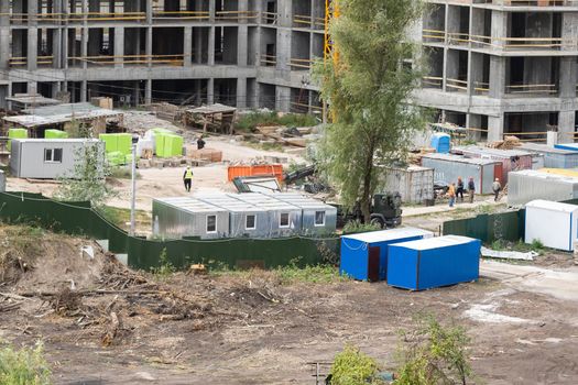 Construction site with crane and building