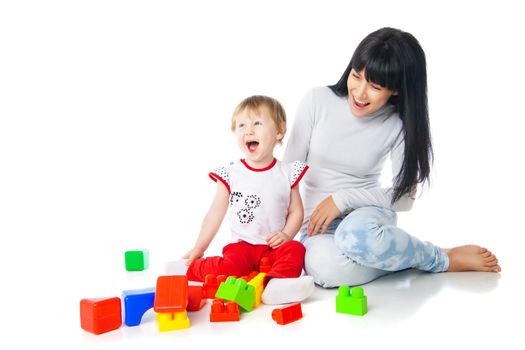 mother and baby playing with building blocks toy isolated on white