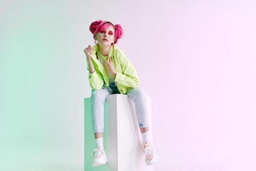 glamorous fashionable woman with pink hair posing hipster neon. High quality photo