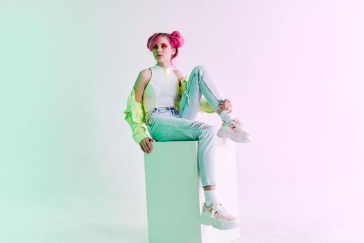 fashionable woman pink hair posing fashion clothes Acid style design. High quality photo