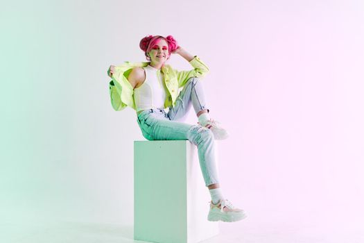 woman with pink hair teen fashionable clothes posing neon. High quality photo