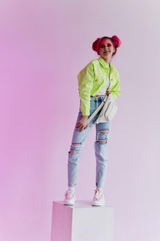 fashionable woman pink hair posing fashion clothes Acid style design. High quality photo