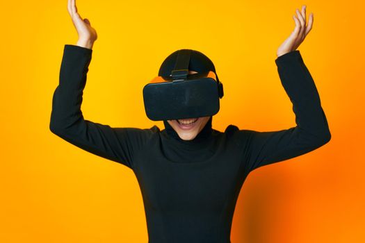 Muslim in black hijab VR glasses emotions studio lifestyle. High quality photo