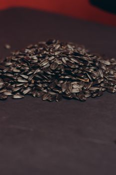 natural product sunflower seeds handing close-up food. High quality photo