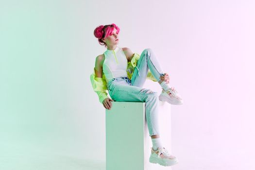 fashionable woman pink hair posing fashion clothes lifestyle fun design. High quality photo