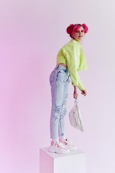 pretty woman with pink hair creative neon background. High quality photo