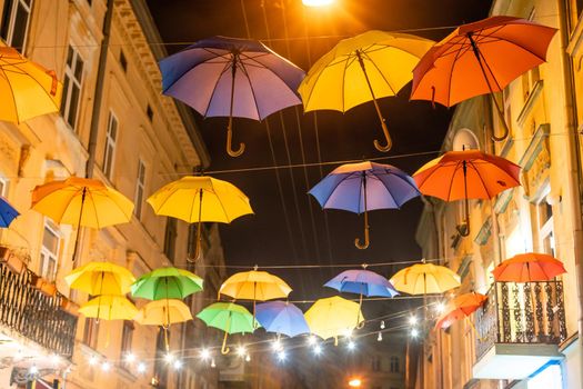 Street decorated with colored umbrellas. Lviv Ukraine