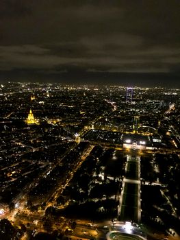 Night view, panorama of Paris from the top the Eiffel Tower.