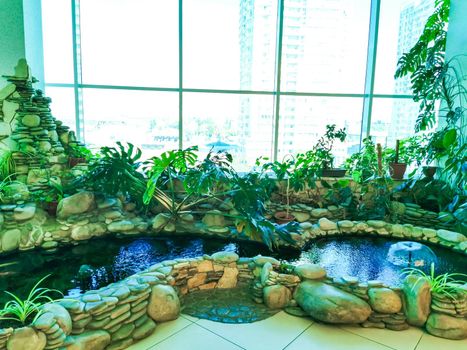 decorative lake with fish indoors