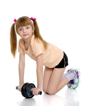 A nice little girl is performing gymnastic exercises. Concept of a healthy lifestyle, sport and fitness. Isolated on white background.