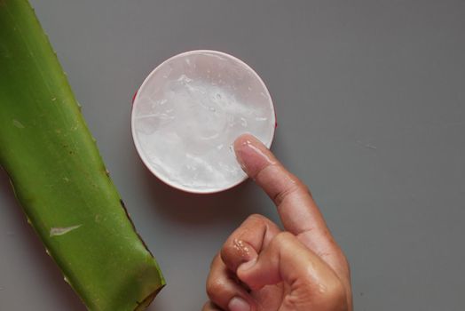 Close-up Fresh Aloe vera sliced and liquid gel on white background ,