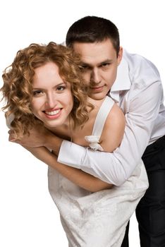 Portrait of a beautiful young happy smiling couple - isolated