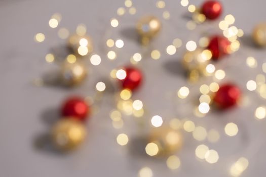 Festive Christmas background of defocused decorated xmas tree bokeh composition.