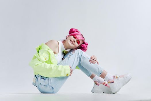 woman with pink hair teen fashionable clothes posing neon. High quality photo